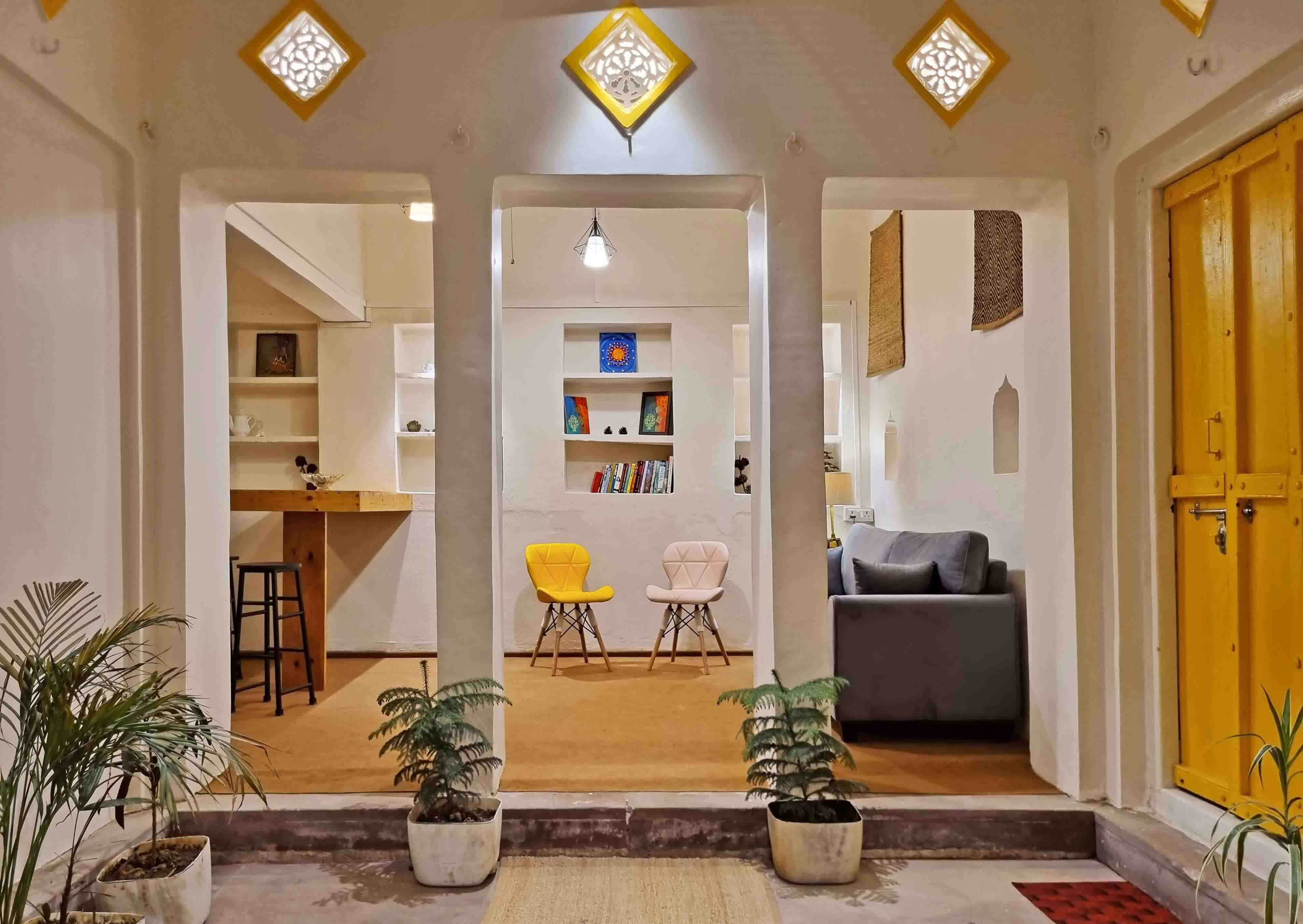 Vintage homestay courtyard with warm lighting and homely vibes